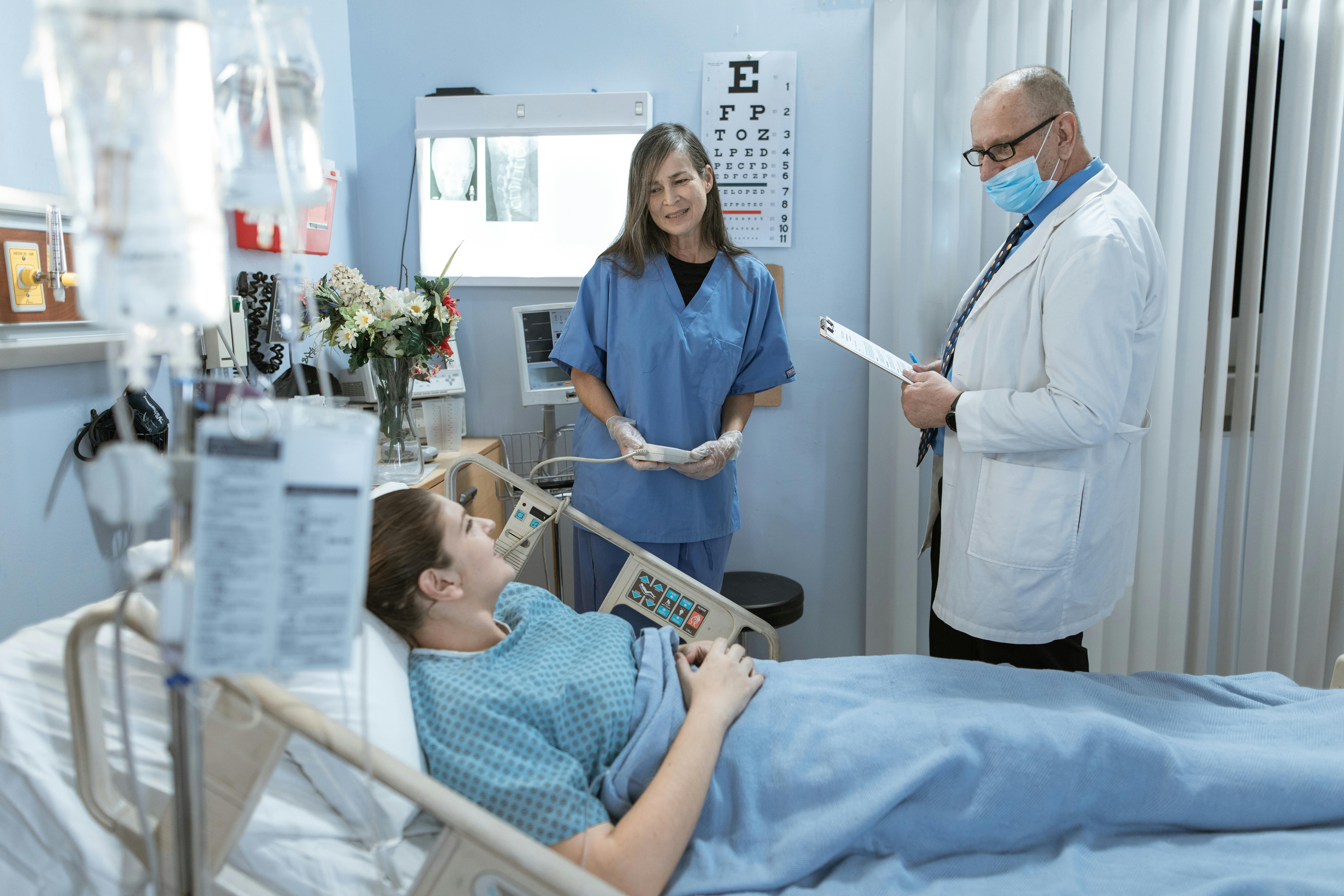 Dr. Prof. Dr. Md. Billal Alam with patient